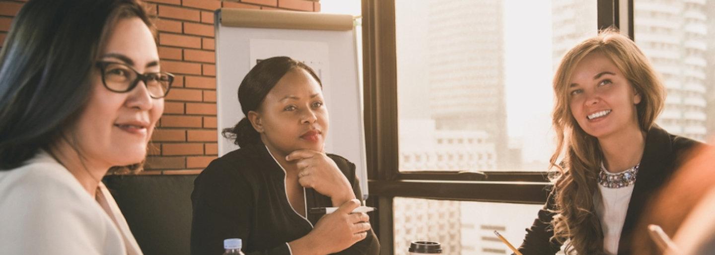 Three women in a meeting