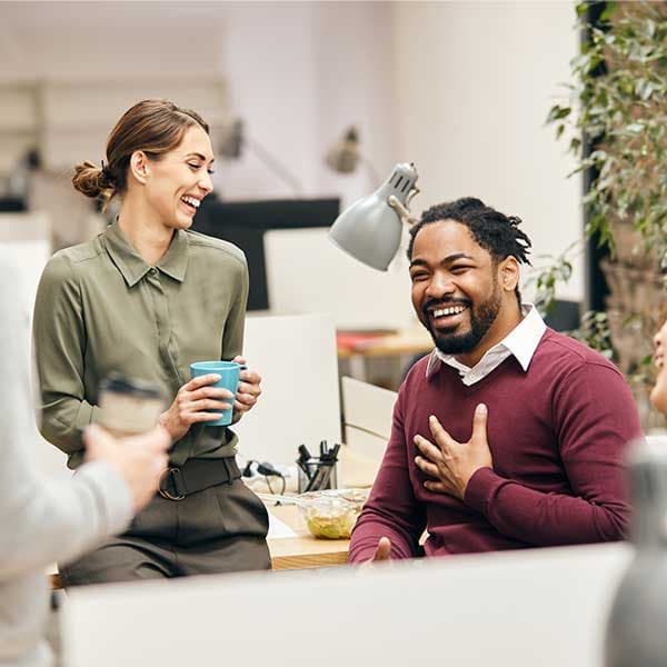 Team laughing and enjoying work